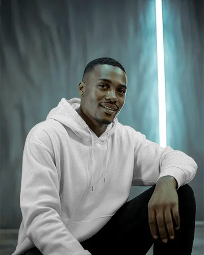 Seated Male Model Hoodie Mockup Under Glowing Blue Strip Light