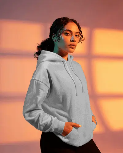 Dramatic Orange Windowlight Hoodie Mockup Female Model Standing