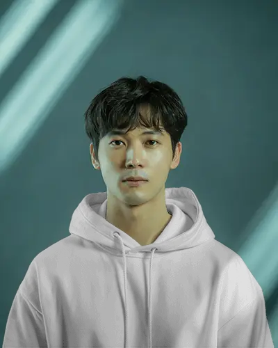 Studio Lit Hoodie Mockup Male Model Facing Forward With Soft Gradient Background And Subtle Light Streaks