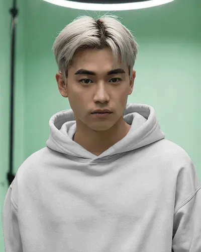 Modern Studio Hoodie Mockup Male Model In Hoodie Against Pastel Green Background With Overhead Light