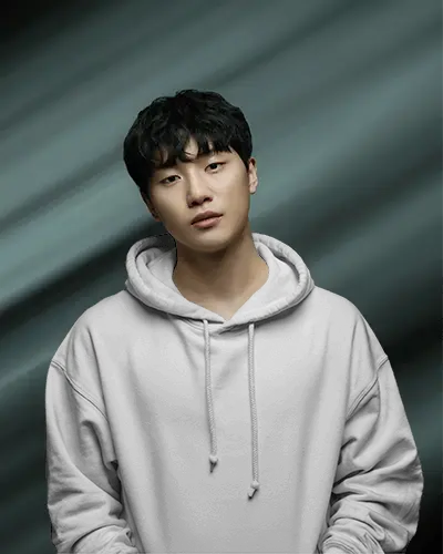 Fashion Forward Hoodie Mockup Male Model In Relaxed Pose Against Diagonal Motion Blur Background