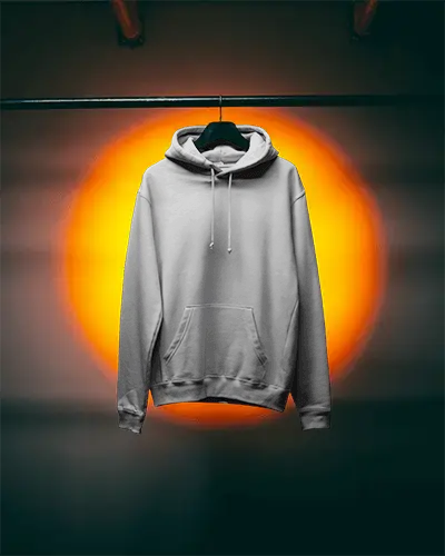 Front View Hoodie Mockup Hanging Display Against Warm Orange Light Centerpiece In Dark Room 0763