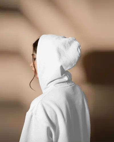 Back View Hoodie Mockup Female Model Wearing Hood Under Soft Diffused Shadow Lighting