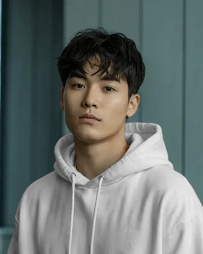 Portrait Style Hoodie Mockup Casual Male Model In Soft Studio Lighting With Muted Tones