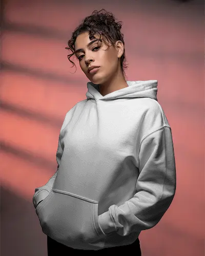 Confident Pose Hoodie Mockup Woman In Casualwear With Hands In Pocket Under Moody Light