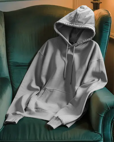 Cozy Interior Hoodie Mockup On Green Armchair Evening Lighting Comfortable Lifestyle Setting 0795