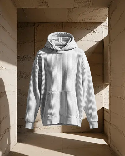 front-view-ribbed-texture-hoodie-mockup-symmetrically-in-framed-sunlit-stone-background