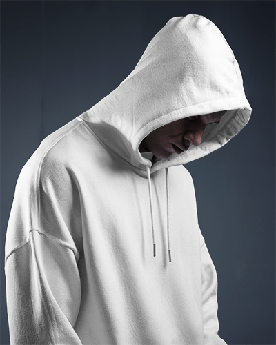 Moody Dark Studio Hoodie Mockup Side Profile Male Model In Hood For Contemplative And Intense Vibe