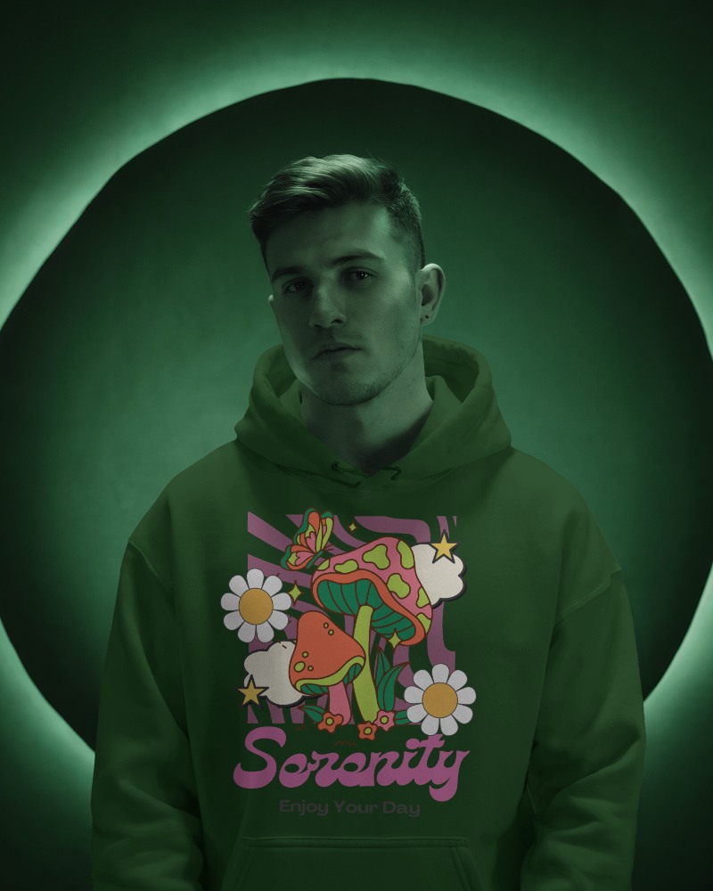 Hoodie Mockup On Male Model With Green Backdrop Dramatic And Modern Vibe