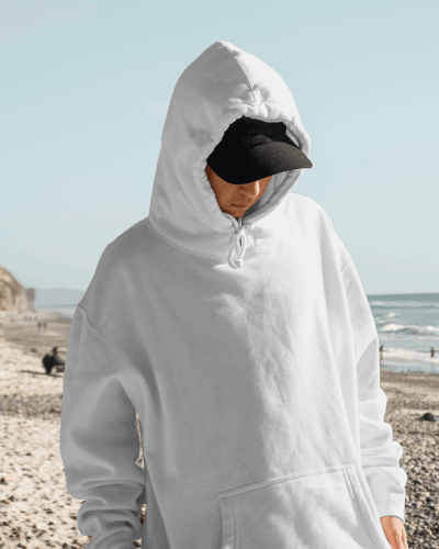 Hoodie Mockup Of A Man Standing On Beach