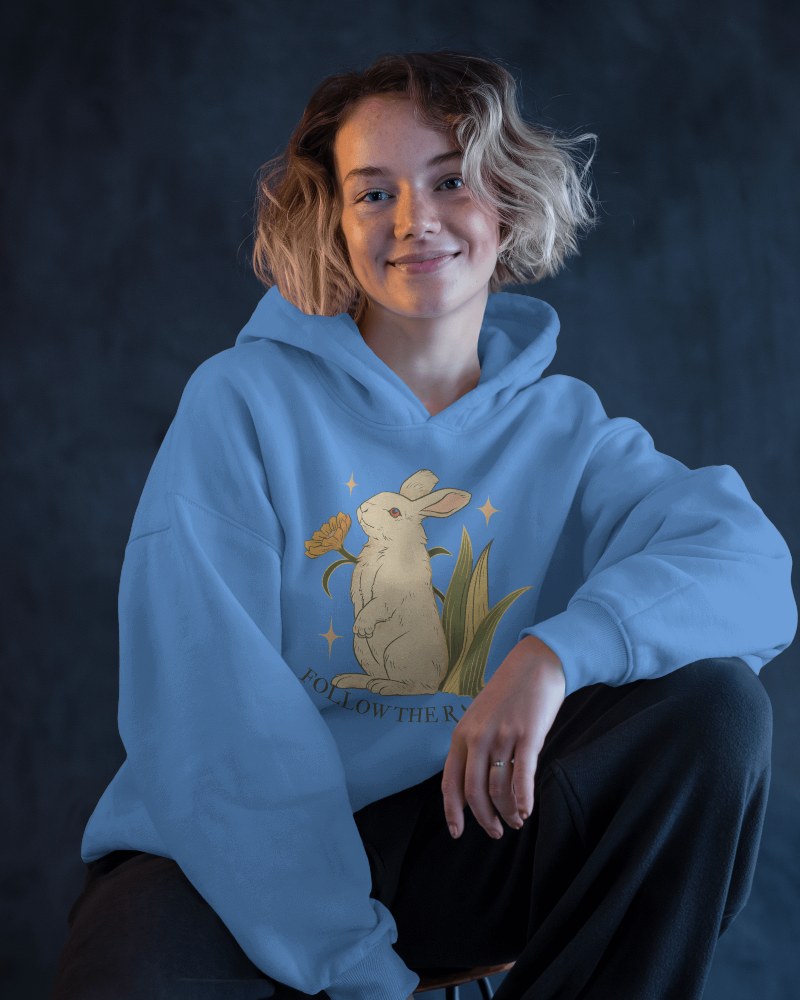 Soft Lit Hoodie Mockup Female Model Smiling With Relaxed Posture Against Neutral Background