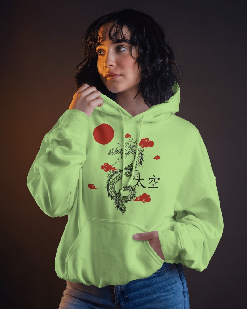 Dynamic Studio Hoodie Mockup Dark Haired Female Model Posing With Hand On Collar Confident Look