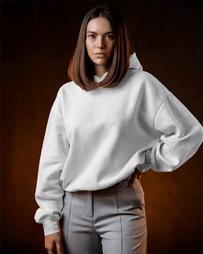Warm Toned Hoodie Mockup Female Model In Neutral Background With Confident Look Modern Style