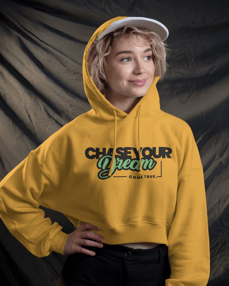 Casual Streetwear Hoodie Mockup Female Model In Hood Smiling With Draped Fabric Background