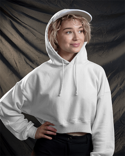 Casual Streetwear Hoodie Mockup Female Model In Hood Smiling With Draped Fabric Background