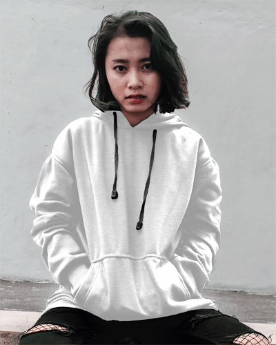 Hoodie Mockup Of An Asian Woman Sitting In Front Of Wall