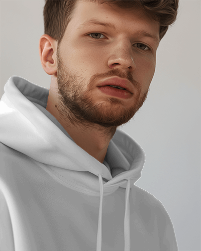 Young Male Model With Frizzy Hair Wearing Hoodie Mockup In Minimalistic Background Scene4