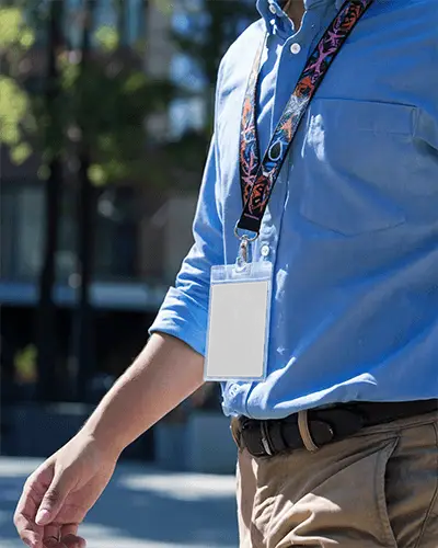 Casual Conference Pass Mockup On Blue Shirt Daylight Scene For Outdoor Networking Events