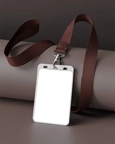 Sleek And Minimal Badge Holder Mockup On Neutral Roll Backdrop With Dark Strap Matte Finish