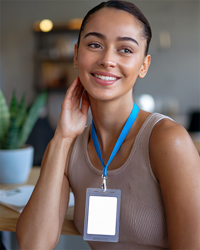 id-card-mockup-smiling-female-model-in-neutral-tank-top-with-blue-lanyard-warm-and-inviting-atmosphere-059
