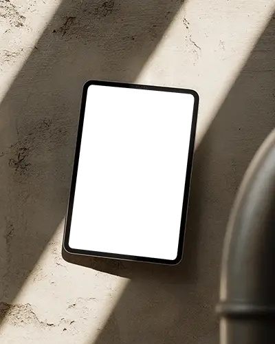 Flat Ipad Pro Mockup Against Rustic Light Wall With Soft Industrial Vibe