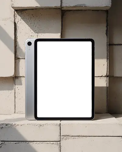 Minimal Ipad Mini Mockup Against Geometric Concrete Wall In Warm Light