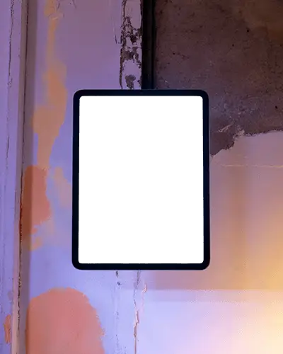 Street Style Ipad Mini Mockup Against Wall With Raw Urban Vibe