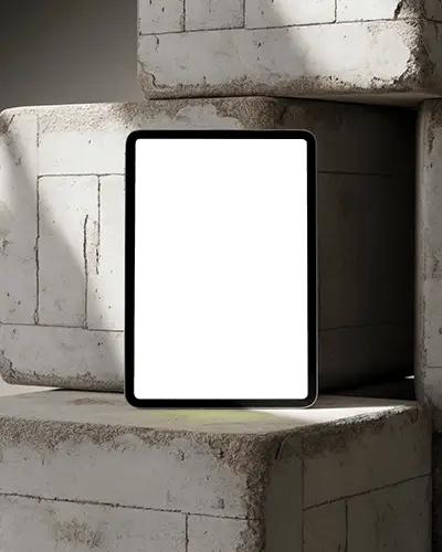Minimalist Ipad Air Mockup Against Stacked Rustic Concrete Bricks