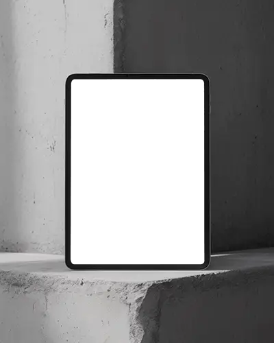 Minimalist Ipad Pro Mockup Against Grayscale Wall With Natural Shadow