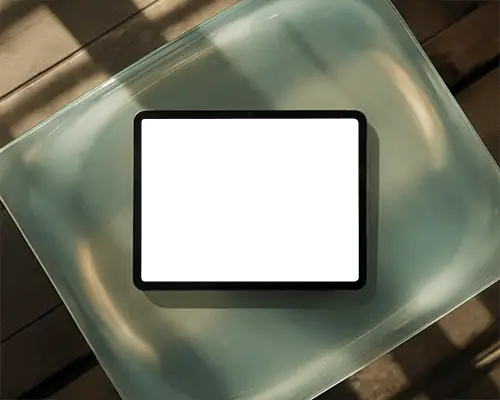 Ipad Pro Mockup Top View On Frosted Glass Table With Sunlight And Wooden Floor Shadows