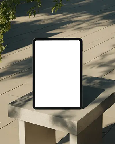 Ipad Mini Mockup Upright On Stone Bench In Sunlit Outdoor Setting With Leaf Shadows