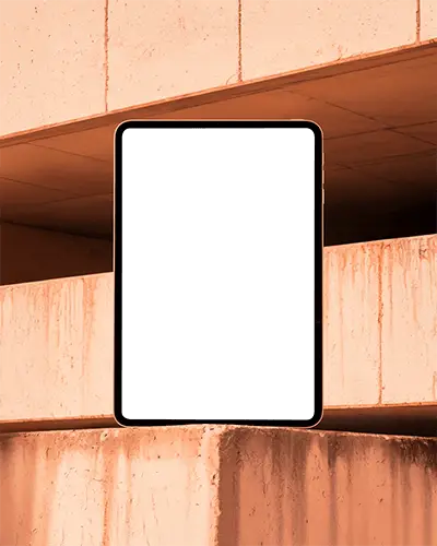 Modern Ipad Air Mockup Centered On Warm Toned Concrete Wall In Urban Structure Setting