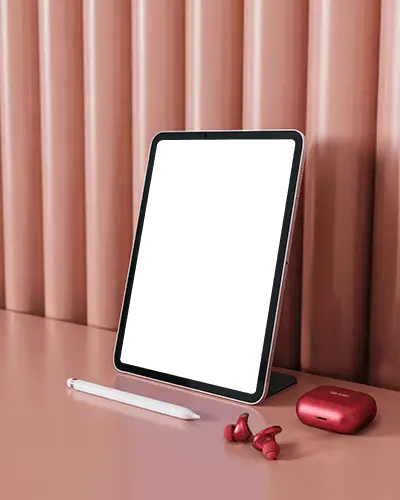 Upright Ipad Air Mockup On Pink Surface With Stylus And Earbuds In Minimal Modern Setup