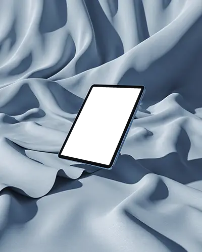 Ipad Mini Mockup Floating Above Smooth Wavy Blue Fabric In Soft Studio Lighting