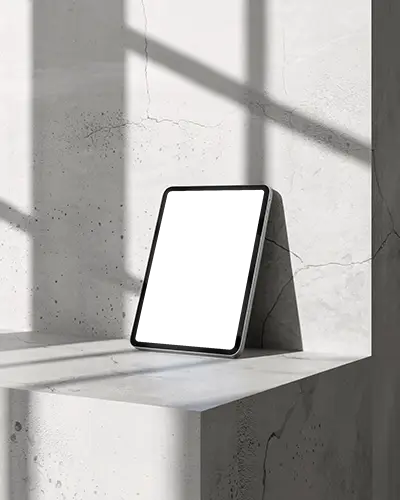 ipad-air-mockup-leaning-on-concrete-surface-in-bright-studio-light-with-window-shadow-lines