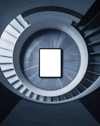 geometric-ipad-mini-mockup-in-modern-round-staircase-seen-from-above-in-blue-toned-light