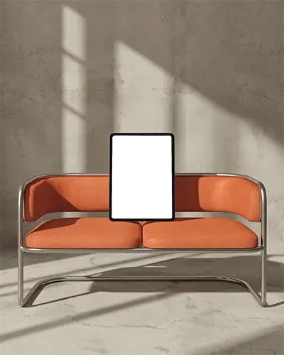 Ipad Pro Mockup Placed On Orange Cushion Bench In Textured Studio With Soft Window Light