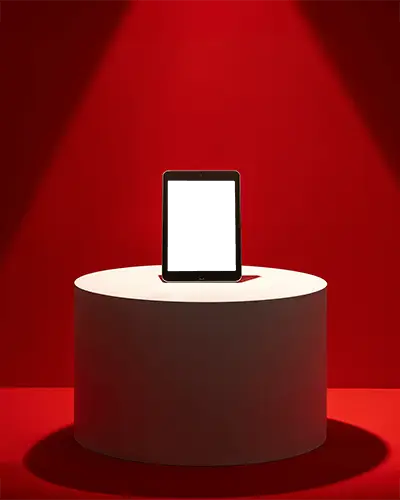 minimalist-ipad-mini-mockup-on-round-pedestal-under-spotlight-in-studio-with-bold-red-background
