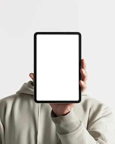 Ipad Air Mockup Held Upright Covering Face Against Clean White Background In Minimal Studio