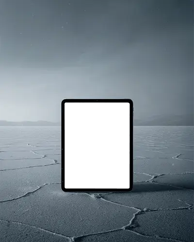 Futuristic Ipad Pro Mockup Tablet Standing On Desert Floor With Stark Texture And Hazy Mountain