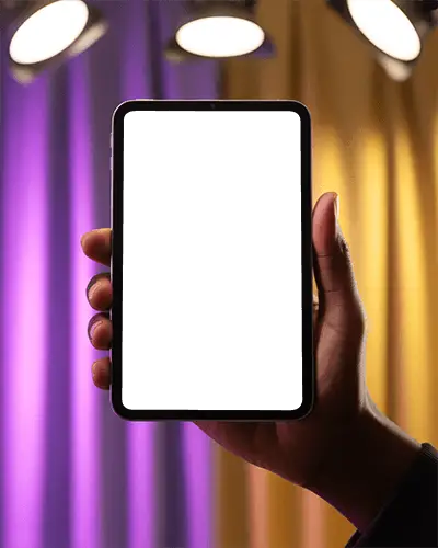 Premium Ipad Mini Digital Mockup Vertical Tablet Held In Hand Against Purple Yellow Stage Light