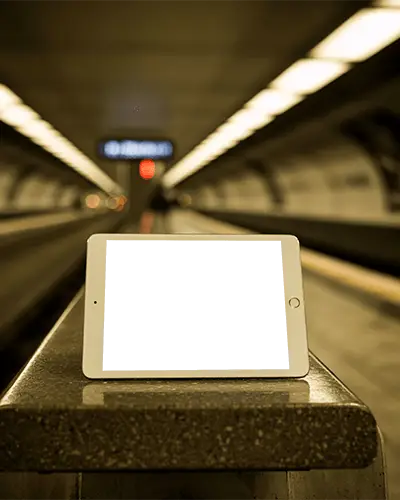 Sleek Ipad Mini Mockup On Concrete Bench With Urban Subway Tunnel Background