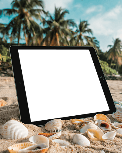 Beachside Ipad Mockup Digital Tablet On Sandy Shore Surrounded By Seashells Showcasing Glowing Whale Art Tropical Paradise Vibes