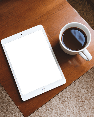 Cozy Tabletop Ipad Mockup White Tablet On Wooden Surface Next To Steaming Coffee Cup Warm And Minimalist Workspace Setup