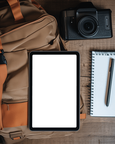 Travel Adventure Ipad Mockup Digital Tablet On Wooden Surface With Backpack Camera And Notebook Exploration And Creative Journey Vibes