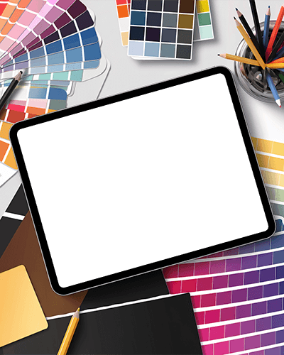Professional Ipad Mockup Digital Device On Graphic Designer Table With Pantone Charts And Sketching Tools