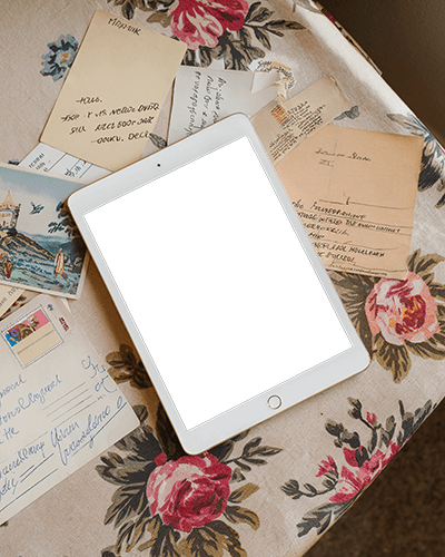 Vintage Aesthetic Ipad Mockup Digital Tablet On Floral Tablecloth With Scattered Handwritten Letters And Postcards