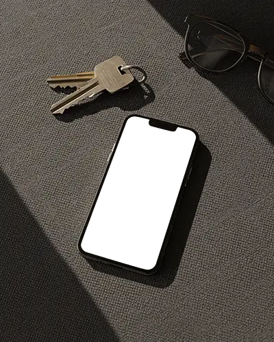 Top View Iphone 14 Mockup On Textile Surface With Glasses And Keys In Warm Sunlight