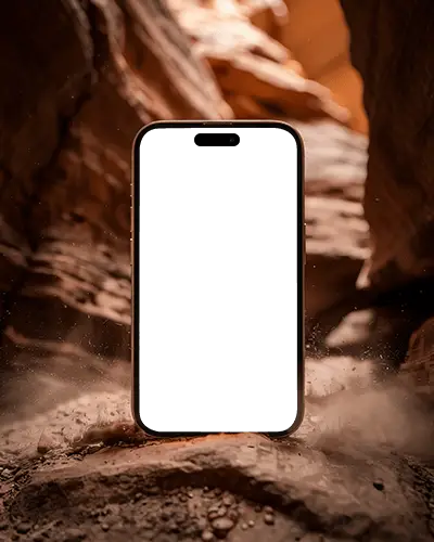 Dramatic Canyon Iphone 16 Plus Mockup Framed By Sandstone Cliffs And Dry Ground