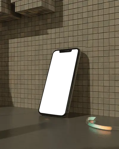 iphone-14-mockup-resting-on-tiled-surface-with-soft-shadow-and-modern-architectural-scene